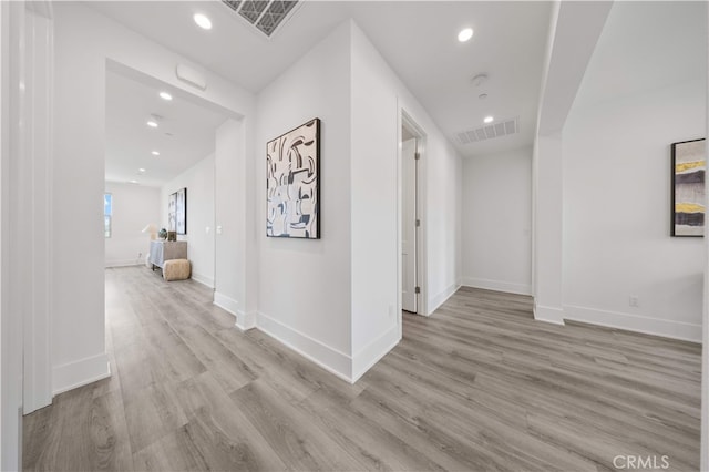 59 Longchamp, Irvine, CA 92602 - hall with wood finished floors, baseboards, and recessed lighting