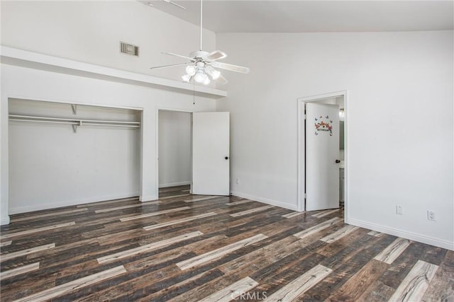 240 E 52nd St, San Bernardino, CA 92404 - unfurnished bedroom featuring wood finished floors, multiple closets, baseboards, high vaulted ceiling, and ceiling fan