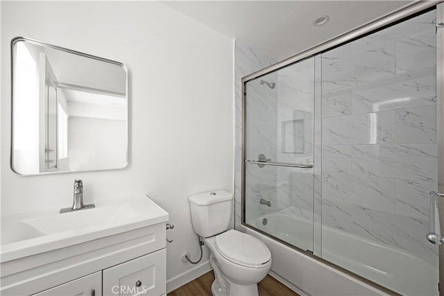 5218 Auckland Ave, Toluca Lake, CA 91601 - bathroom featuring vanity, enclosed tub / shower combo, toilet, and wood finished floors