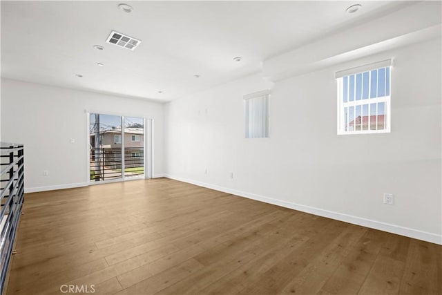 5218 Auckland Ave, Toluca Lake, CA 91601 - empty room featuring baseboards and wood finished floors