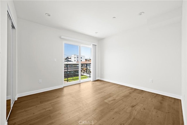 5218 Auckland Ave, Toluca Lake, CA 91601 - empty room featuring wood finished floors and baseboards