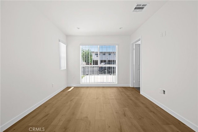 5218 Auckland Ave, Toluca Lake, CA 91601 - empty room with baseboards and wood finished floors