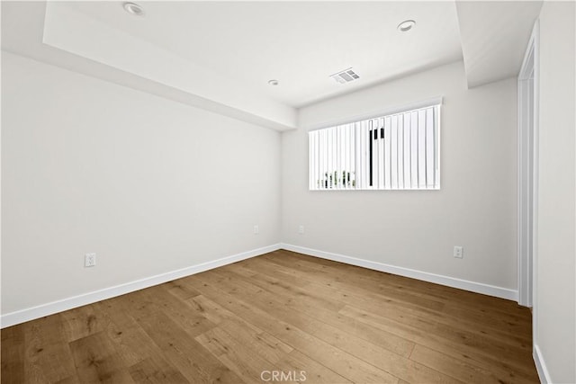 5218 Auckland Ave, Toluca Lake, CA 91601 - unfurnished room with baseboards and wood finished floors