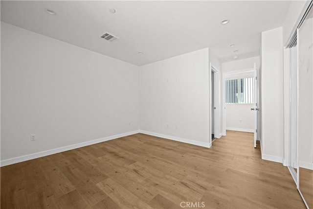 5218 Auckland Ave, Toluca Lake, CA 91601 - unfurnished room with baseboards, light wood-style flooring, and recessed lighting