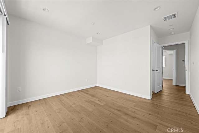 5218 Auckland Ave, Toluca Lake, CA 91601 - spare room with light wood finished floors, baseboards, and recessed lighting