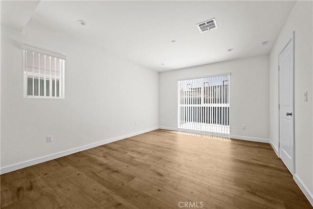 5218 Auckland Ave, Toluca Lake, CA 91601 - spare room featuring wood finished floors and baseboards