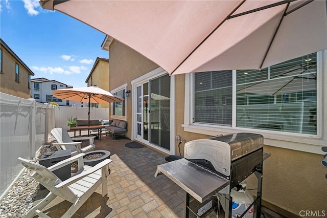 40620 Melrose Dr, Temecula, CA 92591 - fenced backyard featuring a patio area, a fire pit, and a grill