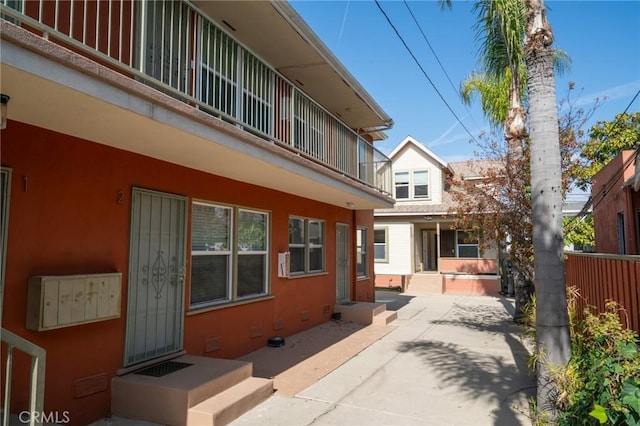 1631 E 4th St, Long Beach, CA 90802 - exterior space featuring a balcony, stucco siding, and a patio area