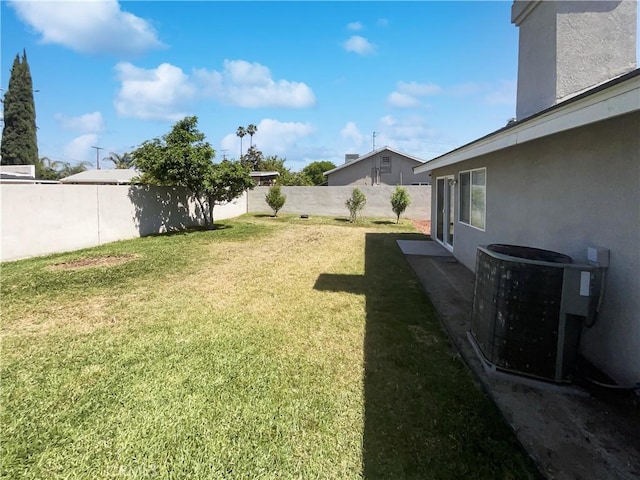 view of yard with central AC unit