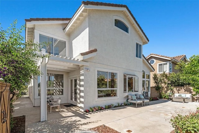 24882 Summerwind, Dana Point, CA 92629 - back of property featuring outdoor lounge area, a patio area, stucco siding, a pergola, and french doors