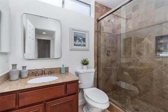 24882 Summerwind, Dana Point, CA 92629 - bathroom with toilet, vanity, and a stall shower