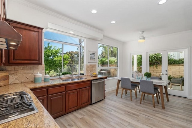 24882 Summerwind, Dana Point, CA 92629 - kitchen with stainless steel appliances, a sink, exhaust hood, backsplash, and ornamental molding
