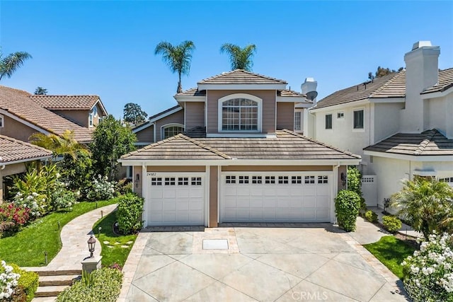 24882 Summerwind, Dana Point, CA 92629 - view of front of home featuring driveway, a garage, and a tiled roof