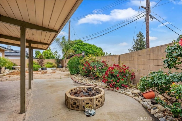 8535 La Vine St, Rancho Cucamonga, CA 91701 - fenced backyard with a patio area and a fire pit