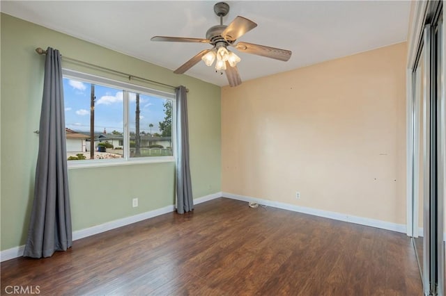8535 La Vine St, Rancho Cucamonga, CA 91701 - spare room with dark wood-style flooring, a ceiling fan, and baseboards