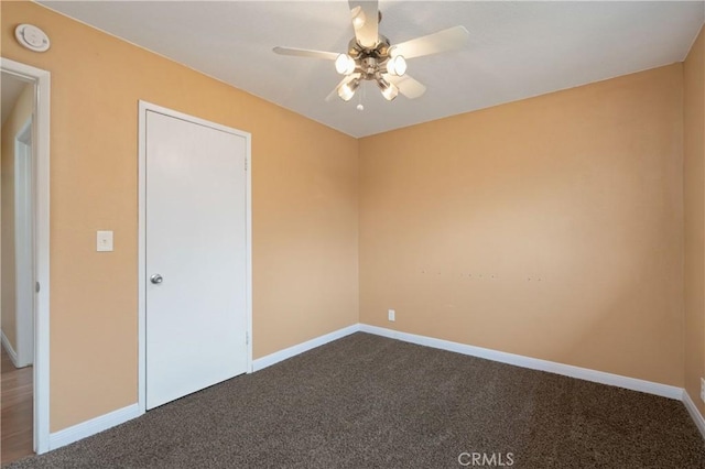 8535 La Vine St, Rancho Cucamonga, CA 91701 - empty room featuring a ceiling fan, dark carpet, and baseboards