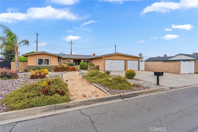 8535 La Vine St, Rancho Cucamonga, CA 91701 - single story home with driveway, stucco siding, and a garage