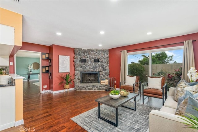8535 La Vine St, Rancho Cucamonga, CA 91701 - living area featuring wood finished floors, a fireplace, baseboards, and recessed lighting