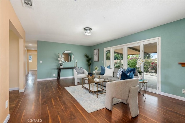 8535 La Vine St, Rancho Cucamonga, CA 91701 - living area featuring dark wood finished floors and baseboards