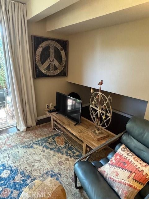 2400 Altisma Way Unit B, Carlsbad, CA 92009 - living room with a chandelier and baseboards