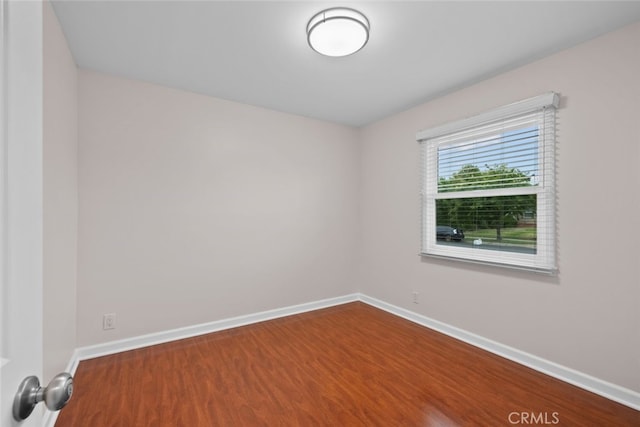17148 Stare St, Northridge, CA 91325 - spare room featuring baseboards and dark wood-type flooring