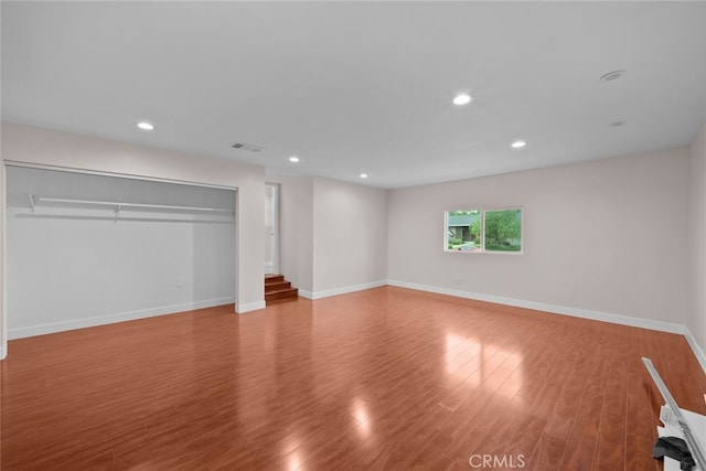 17148 Stare St, Northridge, CA 91325 - unfurnished bedroom with wood finished floors, recessed lighting, baseboards, and a closet