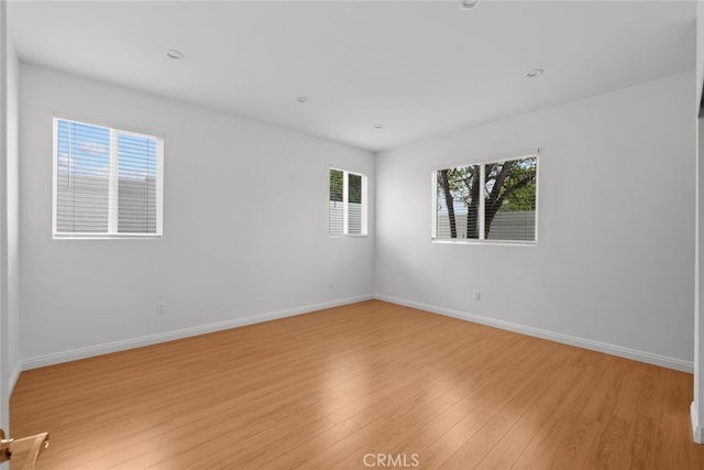 17148 Stare St, Northridge, CA 91325 - unfurnished room with light wood-type flooring, baseboards, and recessed lighting