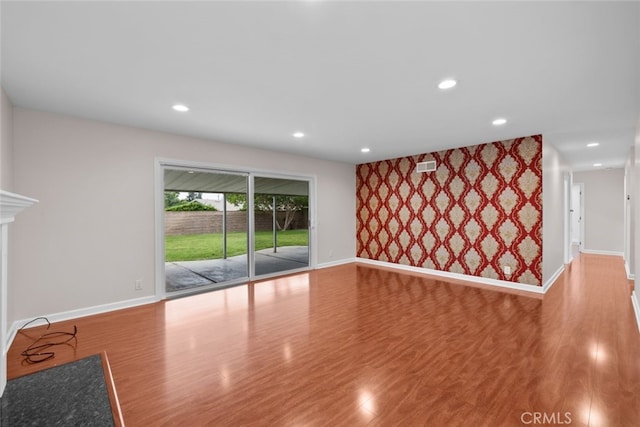 17148 Stare St, Northridge, CA 91325 - unfurnished living room with baseboards, wood finished floors, and recessed lighting