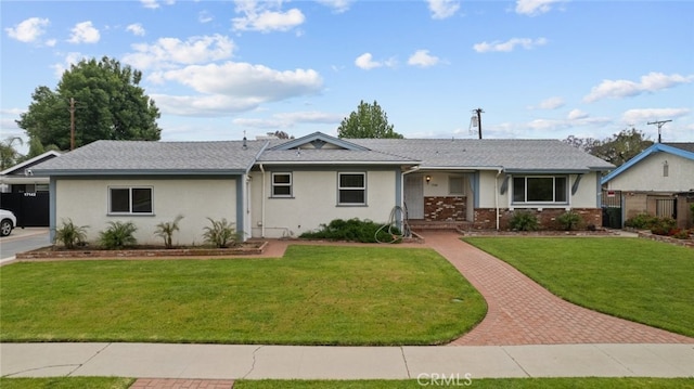 17148 Stare St, Northridge, CA 91325 - ranch-style home featuring a front yard and stucco siding