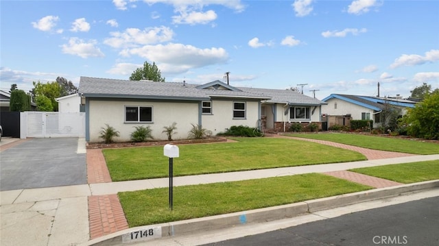 17148 Stare St, Northridge, CA 91325 - view of front facade with a gate and stucco siding