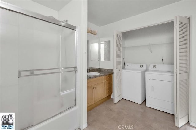 100 S Alameda St Unit 162, Los Angeles, CA 90012 - laundry room featuring washing machine and dryer and light tile patterned floors