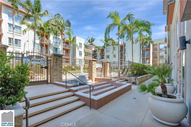 100 S Alameda St Unit 162, Los Angeles, CA 90012 - view of property's community featuring a gate and a residential view