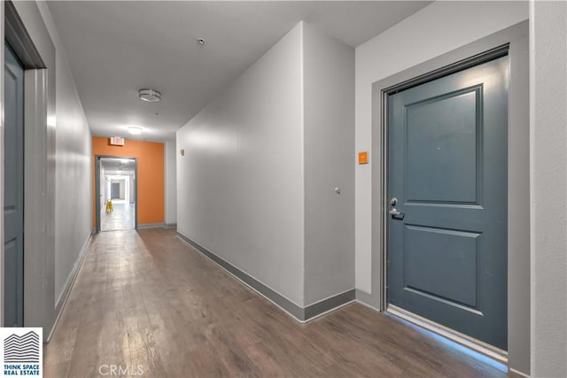 100 S Alameda St Unit 162, Los Angeles, CA 90012 - corridor featuring wood finished floors and baseboards