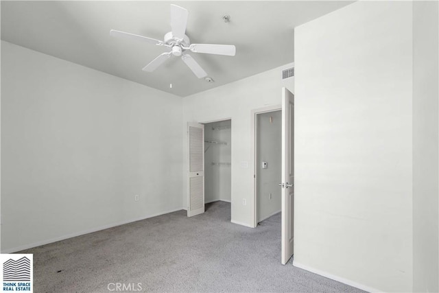 100 S Alameda St Unit 162, Los Angeles, CA 90012 - unfurnished bedroom featuring carpet floors, baseboards, a closet, and a ceiling fan