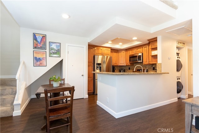 28956 Canyon Lake Dr Unit 43, Lake Forest, CA 92679 - kitchen featuring stainless steel appliances, recessed lighting, light stone counters, dark wood-style floors, and open shelves