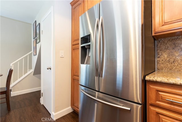 28956 Canyon Lake Dr Unit 43, Lake Forest, CA 92679 - kitchen with stainless steel fridge with ice dispenser, dark wood-type flooring, light stone countertops, and tasteful backsplash