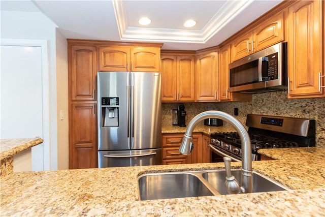 28956 Canyon Lake Dr Unit 43, Lake Forest, CA 92679 - kitchen with appliances with stainless steel finishes, tasteful backsplash, light stone counters, crown molding, and recessed lighting
