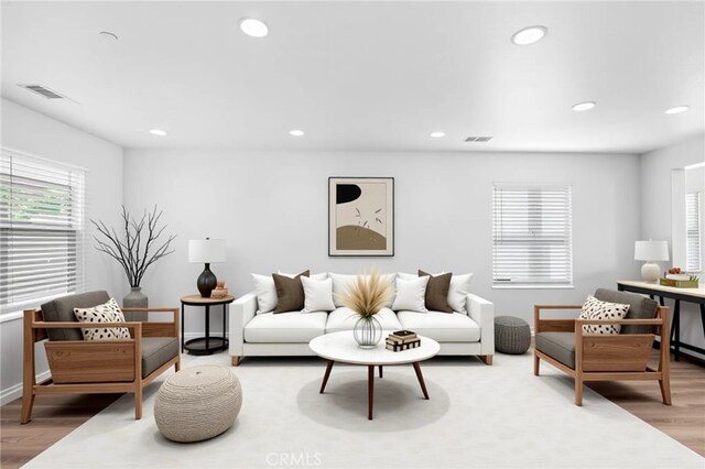 30183 Redding Ave, Murrieta, CA 92563 - living room with wood finished floors, recessed lighting, and baseboards