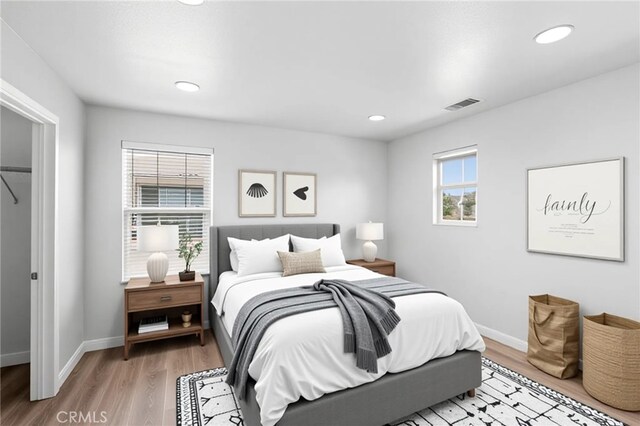 30183 Redding Ave, Murrieta, CA 92563 - bedroom with wood finished floors, baseboards, and recessed lighting