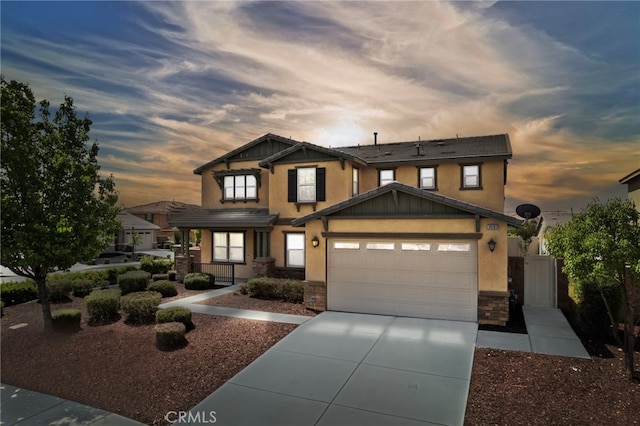 30183 Redding Ave, Murrieta, CA 92563 - craftsman inspired home featuring driveway, stone siding, an attached garage, and stucco siding