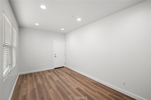 30183 Redding Ave, Murrieta, CA 92563 - unfurnished room featuring wood finished floors, recessed lighting, and baseboards