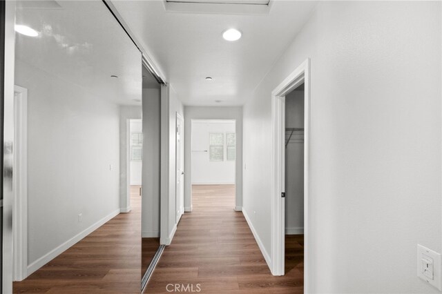 30183 Redding Ave, Murrieta, CA 92563 - corridor with wood finished floors, baseboards, and recessed lighting