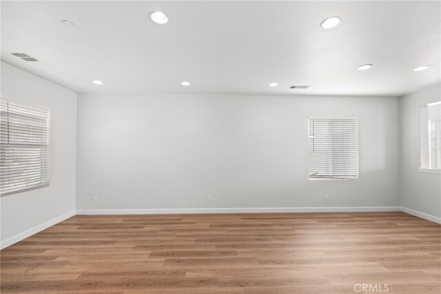 30183 Redding Ave, Murrieta, CA 92563 - empty room with recessed lighting, light wood-style flooring, and baseboards