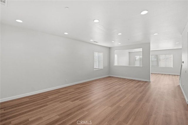 30183 Redding Ave, Murrieta, CA 92563 - empty room featuring recessed lighting, baseboards, and light wood finished floors