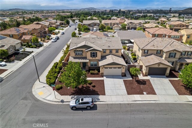 30183 Redding Ave, Murrieta, CA 92563 - aerial perspective of suburban area featuring a mountainous background