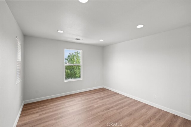 30183 Redding Ave, Murrieta, CA 92563 - unfurnished room with light wood-type flooring, recessed lighting, and baseboards