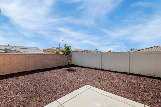 30183 Redding Ave, Murrieta, CA 92563 - fenced backyard with a patio area