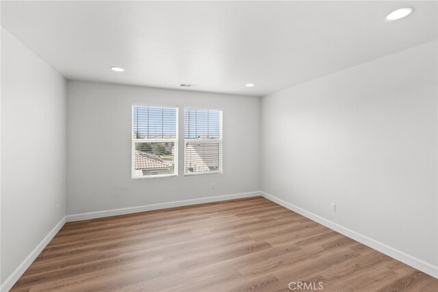 30183 Redding Ave, Murrieta, CA 92563 - spare room featuring baseboards, light wood finished floors, and recessed lighting