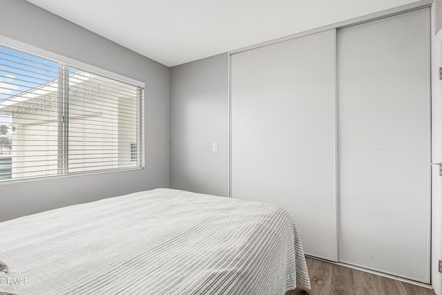 124 N Driskill St, Oxnard, CA 93030 - bedroom with a closet and wood finished floors