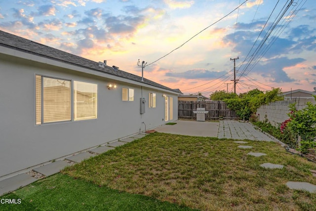 124 N Driskill St, Oxnard, CA 93030 - yard at dusk featuring a patio